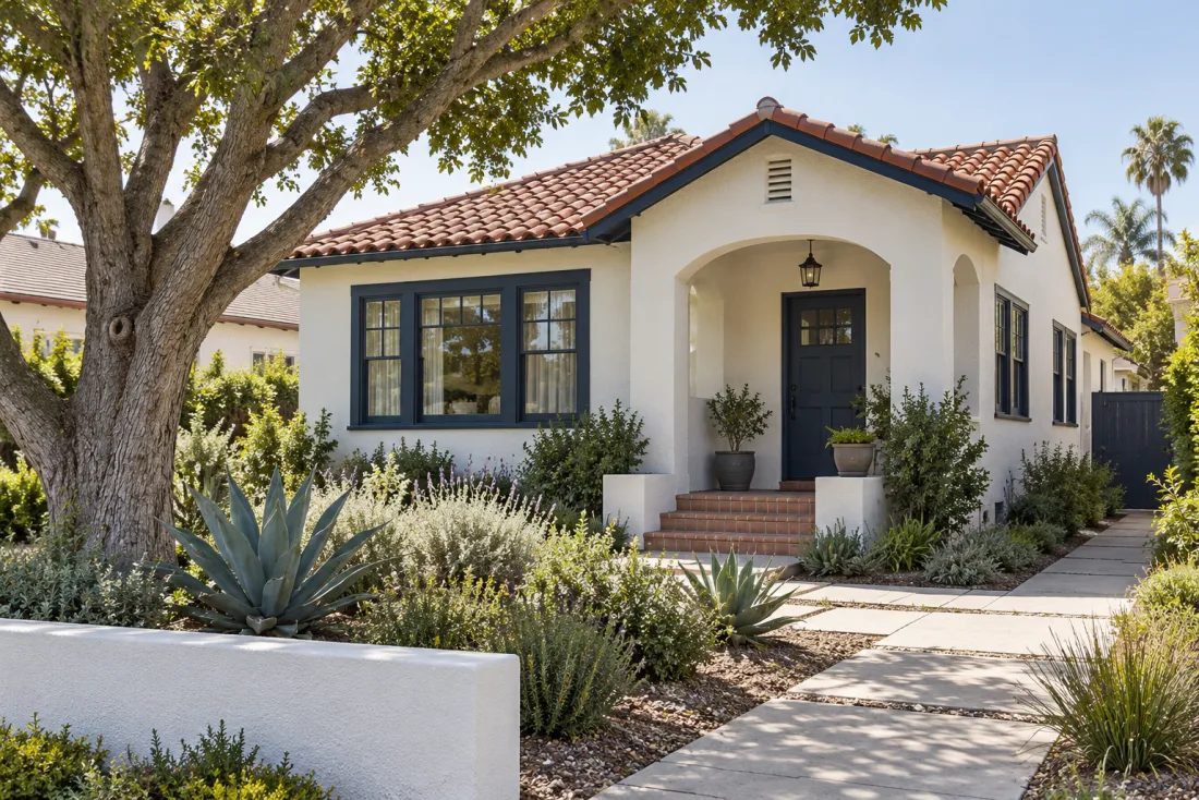 A California bungalow with a terracotta roof and drought-tolerant garden